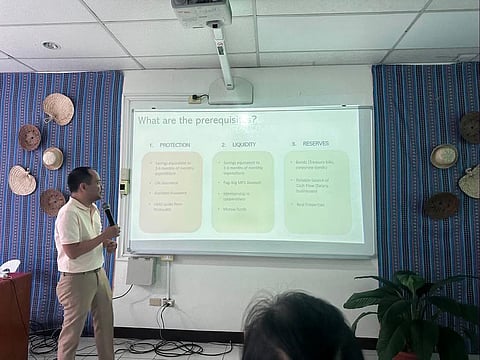 LEARNING THE BASICS. Economist and development consultant Ever Abasolo discusses financial prerequisites for investing during a stock-market workshop, covering protection, liquidity, and financial reserves.