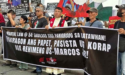 54TH YEAR. Church leaders, youth groups, and anti-corruption advocates led by the Bagong Alyansang Makabayan (Bayan) and Stand in Opposition to Plunder (Stop) Corruption Alliance assemble along Roxas Freedom Park in Davao City on Monday, September 21, 2026 to commemorate the 54th anniversary of the declaration of Martial Law. The group is holding a mobilization to condemn systemic corruption, human rights concerns, foreign intervention, and environmental degradation in Mindanao, while calling for justice and accountability from the current administration.