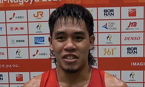 ASIAN GAMES DEBUT WIN. Philippines boxer Norlan Petecio speaks to the media after making a winning Asian Games debut with a unanimous-decision victory over Cambodia’s Vy Sophors in the men’s 70-kilogram preliminaries Sept. 21, 2026, in Nishio, Japan. The victory sent Petecio into the Round of 16 in his first Asiad appearance.