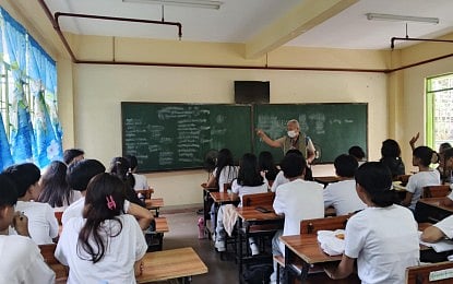 SUSTAINING GAINS. An educator conducts in-person classes in a public school in this undated photo. The Department of Education (DepEd) on Thursday (Sept. 24, 2026) said it has sustained a multiyear increase in Maintenance and Other Operating Expenses allocations through the rollout of its simplified funding formula. (Photo courtesy of DepEd)