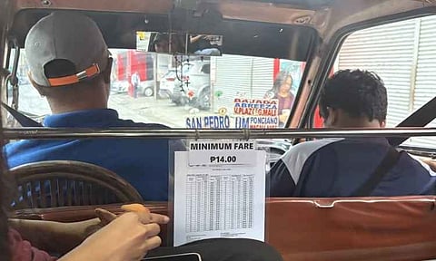 Commuters in Davao City adjust to a ₱14.00 minimum fare inside traditional jeepneys following the implementation of the region's latest public transport rate adjustment. The fare matrix, clearly visible to passengers, outlines the updated pricing structure designed to balance driver livelihoods with commuter affordability across local routes.