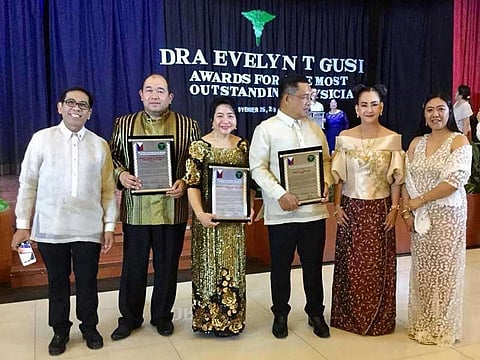 Dr. Valdez receiving his recognition at the Dr. Evelyn Tantamco-Gusi Awards. (Contributed photo)