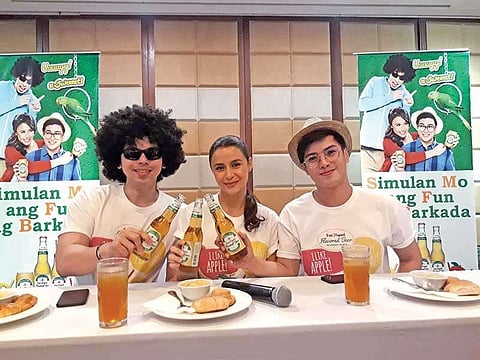 DAVAO. San Miguel flavored beer endorser Yassi Pressman and her gang Fro Bro and Geek Guy toast with SanMig flavored beers for a photo op after the press conference on Sunday, December 22 at Jade Room, Marco Polo Davao. (Contributed photo)