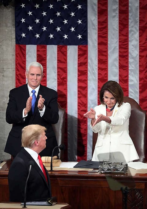 WASHINGTON. President Donald Trump turns to House speaker Nancy Pelosi of Calif., as he delivers his State of the Union address to a joint session of Congress on Capitol Hill in Washington, as Vice President Mike Pence watches, Tuesday, Feb. 5, 2019. (AP)