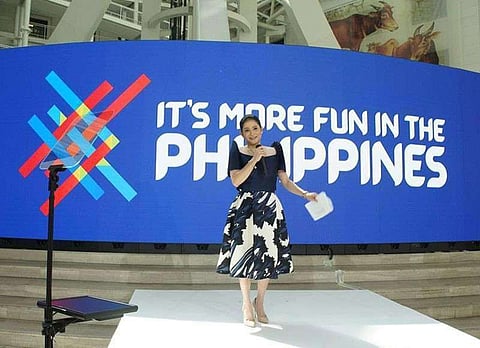 WHAT FUN LOOKS LIKE. Tourism Secretary Bernadette Romulo-Puyat spearheads the launching of the "It's More Fun in the Philippines" campaign. (Photo from the Department of Tourism's Facebook page)