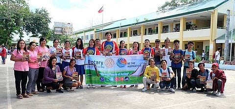 ORMOC. The Rotary Club of Ormoc Bay, through its President Apple Anido Alagon, distributes at least 600 books entitled "Hugs, not Drugs" to 20 high schools in Ormoc City as part of its anti-drug advocacy. (Contributed photo)