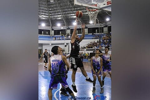 SHOOT. A Jose Maria College (JMC) Kings player shoots against Rizal Memorial Colleges (RMC) Bulldogs defenders during the 2019 Collegiate Sponsors League (CSL) Escandor Cup opening held at Almendras Gym Davao City Recreation Center Sunday, October 13. (COLLEGIATE SPONSORS LEAGUE/ESCANDOR CUP)
