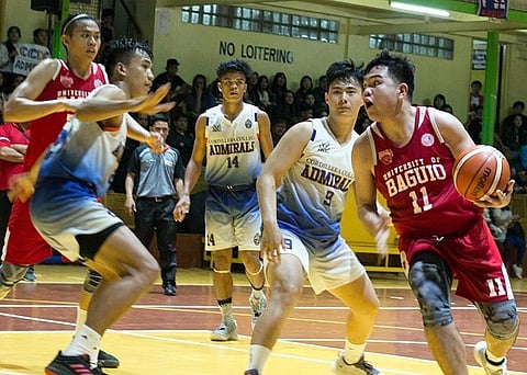 BAGUIO. University of Baguio Cardinals rookie Bheniedick Lozano goes for a drive against a sea of Cordillera Career Development College Admirals defenders Tuesday afternoon, November 5, 2019. Lozano finishes the ball game with a team high. (Jean Nicole Cortes)