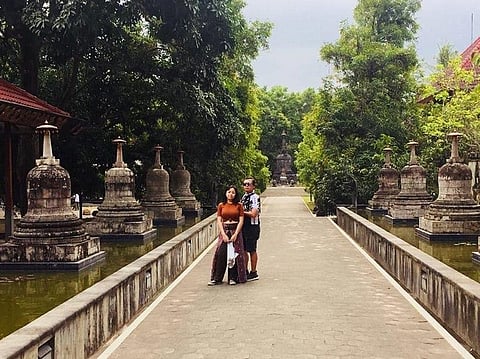 Anne Drew and Peterey took a walk on Candi Mendut Monastery walkway.