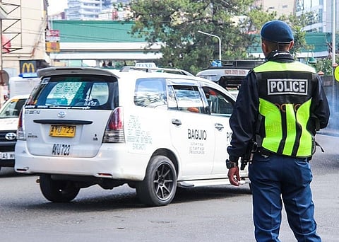 BAGUIO. Traffic enforcers are on alert this holiday season due to the influx of tourists as congestion of vehicles is expected to get worse with the long holiday. (Photo by Jean Nicole Cortes)