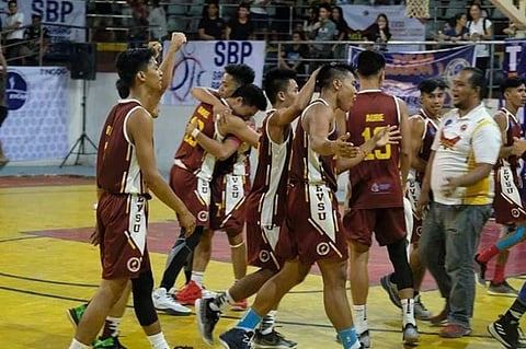 LEYTE. Eastern Visayas State University (Evsu) basketball team celebrates after winning against the Samar State University (SSU) during the game 2 of the Eastern Visayas Collegiate Athletic Association (Evcaa) tournament at the Tacloban City Convention Center on April 6, 2019. (File photo)