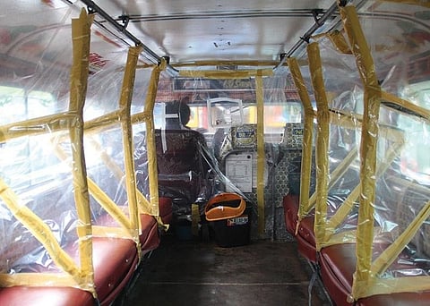 BAGUIO. Jeepney drivers in Baguio City use plastic sheets to maintain physical distancing as a precautionary measure against the threat of Covid-19. (Lauren Alimondo)