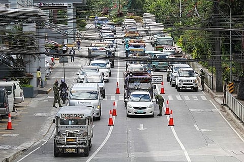 BAGUIO. A portion of Harrison Road, near the Sunshine Park looks packed as motorists follow designated area for PUVs, private and official service vehicles and those granted permits for essential businesses. (Photo by Jean Nicole Cortes)