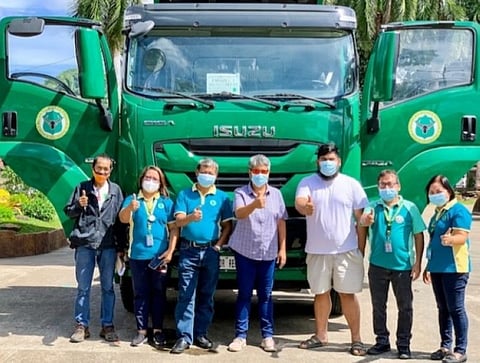 MOISES PADILLA. Officials led by Mayor Ella Celestina Garcia-Yulo during the inauguration of the newly purchased P7 million heavy equipment for the town on Tuesday. (Contributed Photo)