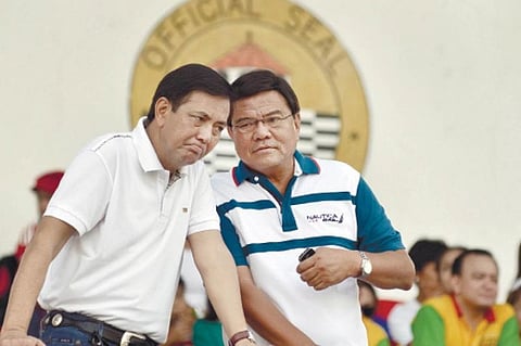 ROLE REVERSAL. This 2014 photo shows then mayor Michael Rama (left) conferring with then vice mayor Edgardo Labella. Rama, who is now vice mayor to Labella's mayor, has called on the latter to show up at City Hall to address the city's Covid-19 situation. The mayor has been working at home for the last two weeks. (SunStar file)