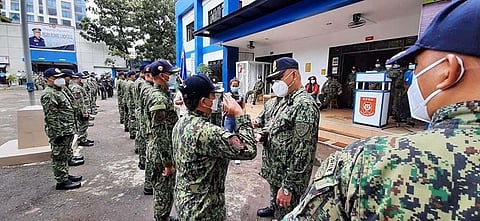 PNP Chief Debold Sinas inspects the troops Saturday morning, Feb. 20, 2021. (Photo by Arnold Bustamante)