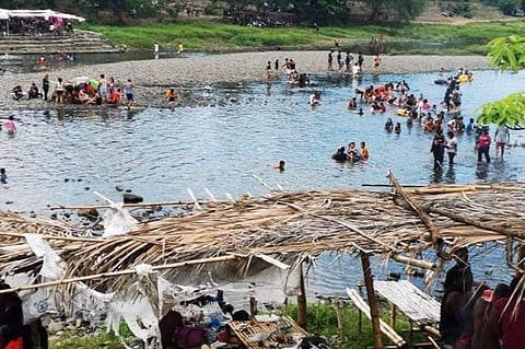 GATHERING AT THE RIVER. A crowd swam and went on a picnic at the Bakas River in Barangay Matictic, Norzagaray town, Bulacan province last Sunday, May 23, 2021, in violation of IATF health protocols and local ordinances. (PRO-Central Luzon)
