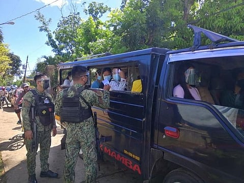 ZAMBOANGA. Policemen manning quarantine checkpoint inspect the quarantine passes of passengers aboard public utility jeep as this city remains under modified enhanced community quarantine (MECQ) until Number 15. Zamboanga City Mayor Maria Isabelle Climaco-Salazar told the village officials to use and spend their disaster quick response funds in the fight against coronavirus disease 2019 (Covid-19). (SunStar Zamboanga)