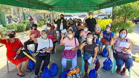 ATE KAY CARES. PDP-Laban standard bearer and aspiring Third District board member Raquel "Ate Kay" Pineda and Councilor Rex Calma distributed on Friday, November 12, 2021, guarantee letters of P3,000 each and food packs to 50 dialysis patients at the Mexico Community Hospital. Pineda is also the co-founder of Patrol Partylist. (Chris Navarro)