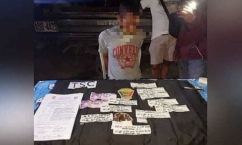 ZAMBOANGA. Policemen arrest an alleged member of a drug syndicate in an anti-drug operation Wednesday, August 3, in Zamboanga City. A photo handout shows the arrested suspect and the pieces of evidence seized from him. (SunStar Zamboanga)