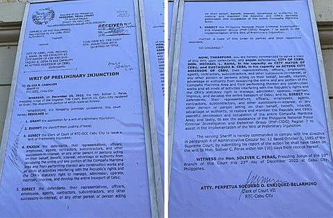 CEBU. A copy of a writ of preliminary injunction issued by the Regional Trial Court in December 2022 has been displayed on the walls of the abandoned Compania Maritima building in downtown Cebu City. (Photo by Philip Cerojano)