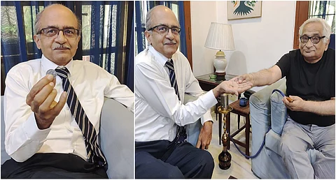 ഒരു രൂപാ നാണയവുമായി പ്രശാന്ത് ഭൂഷണ് ; കോടതിയലക്ഷ്യ വിധിക്ക് ശേഷമുള്ള ആദ്യ പ്രതികരണം