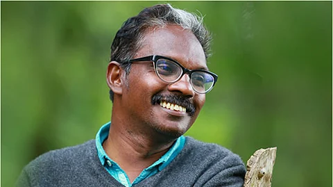 Dr. Biju