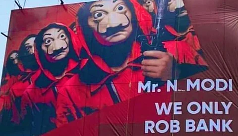 ഞങ്ങള് ബാങ്ക് മാത്രമേ കൊള്ളയടിക്കാറുള്ളൂ,  മോദിക്കെതിരെ ഹൈദരാബാദില് മണിഹൈസ്റ്റ് ഹോര്ഡിങ്ങുകള്