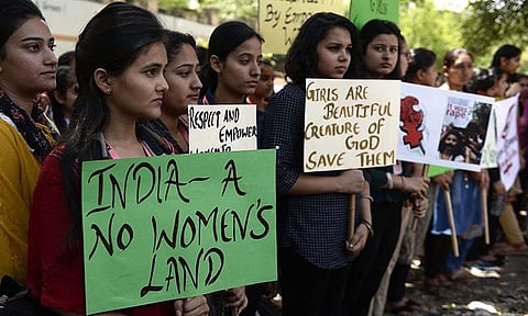 Indian students take part in a protest in Jalandhar on April 16, 2018, over the high profile rape cases in Jammu and Kashmir and Uttar Pradesh states.
Indian police have made another arrest after the alleged rape of a teenager by a ruling party politician sparked protests across the country, federal investigators said April 15.
/ AFP PHOTO / SHAMMI MEHRA