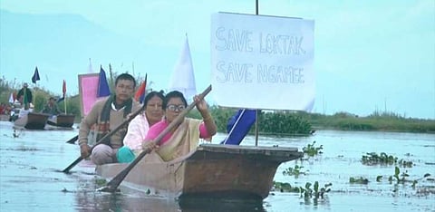 Photo credit: Imphal Free Press, ‘Manipur:10th Loktak Arson Commemoration Day observed at Champu Khangpok floating village’, 15 November 2021.