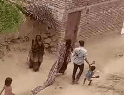 A video of the incident has surfaced, showing Sanjay Singh dragging the woman toward a car while his accomplices follow, armed with sticks. The accused forcibly shoved the woman and her children into the vehicle before fleeing the scene.