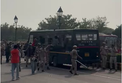 Delhi Police detaining protestors approaching Jantar Mantar on Saturday afternoon.