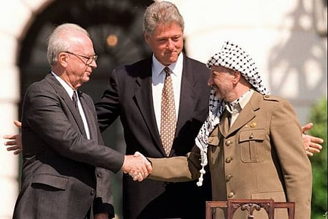 PM Yitzhak Rabin with President Clinton and Yasser Arafat during the signing of the Oslo I Accord in 1993