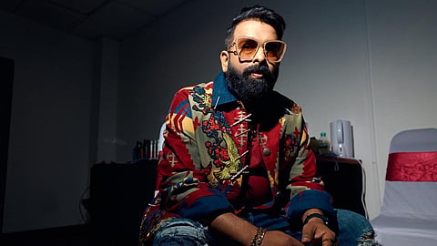 Folk artist loses music instruments in floods, Santhosh Narayanan promises help