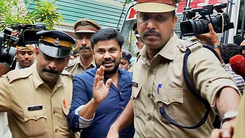 File picture of Dileep with the police