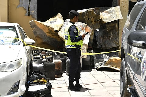 Police at the site of the fire accident