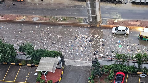 Bengaluru: Garbage spills onto Bannerghatta road, clogs drains after heavy rain
