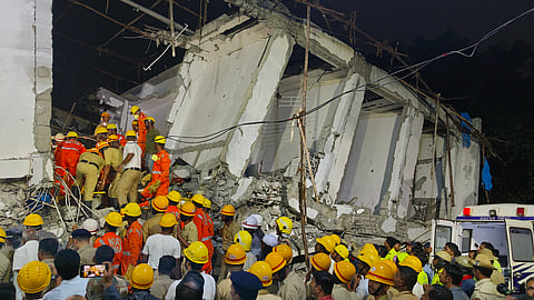 Rescue workers survey the collapsed building in Bengaluru’s Babusapalya, October 22, 2024