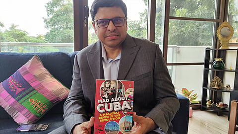 Ullekh NP with his book 'Mad About Cuba'