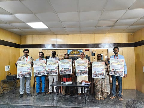 Karnataka construction workers union protest repeal of welfare acts
