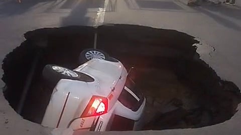 Lucky escape for family of four as taxi falls into sinkhole in Chennai
