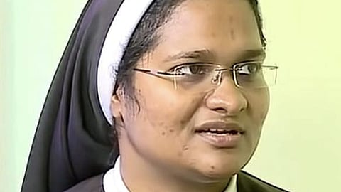 An old photo of Sister Anupama in her nun's habit and glasses, during her time as a member of the Catholic religious order in Kerala.