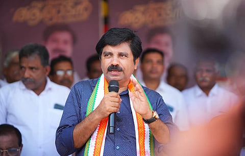 image featuring Aryadan Shoukath, wearing blue shirt