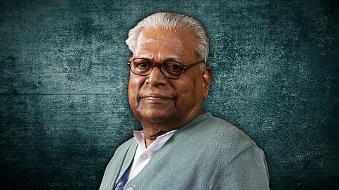A side profile of VS Achuthanandan in a white shirt and greyish green sweater against a stylised green background.
