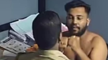 BS Sujith, a Youth Congress leader being assaulted by police