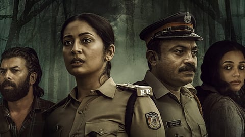 Poster of the Malayalam film Pathirathri, showing actors Soubin Shahir, Navya Nair, Sunny Wayne, and Ann Augustine in a forest backdrop, with Navya and Soubin dressed as police officers from the Kerala Police.