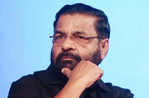 Image featuring Kadakampally Surendran wearing a black shirt