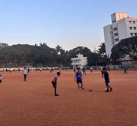 Children playing at Nandan Football Ground in Austin Town in Bengaluru.
