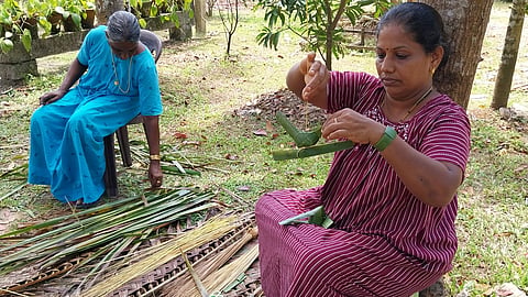 Women craft toys with coconut leaves in Kumbalangi village