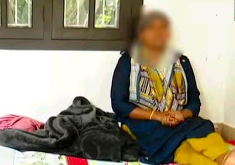 The image featuring Haseena sitting in veranda
